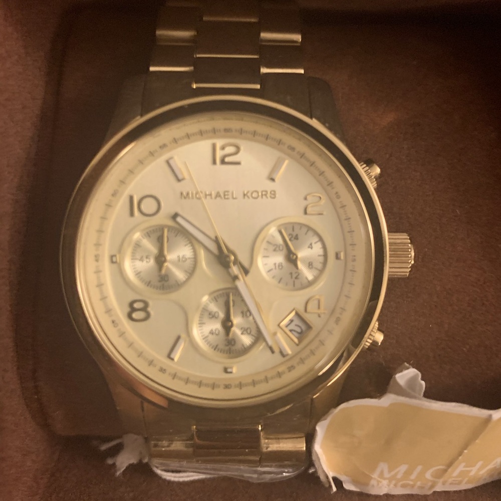 Michale Kors gold watch.